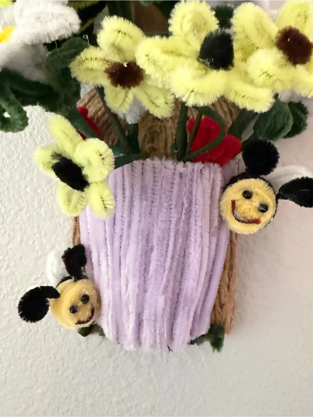 Whimsical Purple Flower Pot Wall Art with Yellow Bee Accents